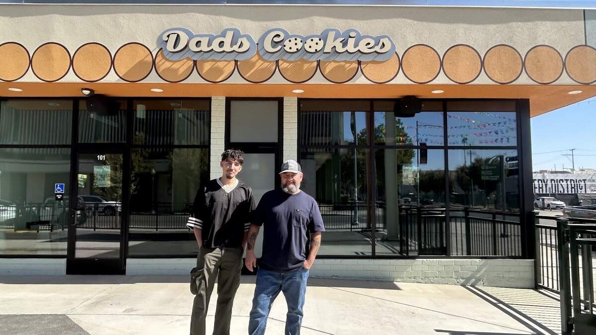 Jordan Sanchez, left, and Lance Sanchez, stand outside the soon-to-be-open Dad’s Cookies location in the Brewery District.